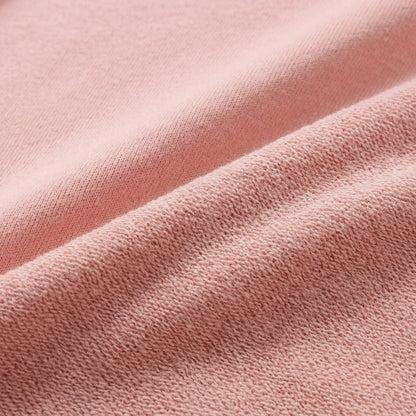 Nahaufnahme rosa Strickpullover mit weicher, angerauter Innenseite und feiner Maschenstruktur