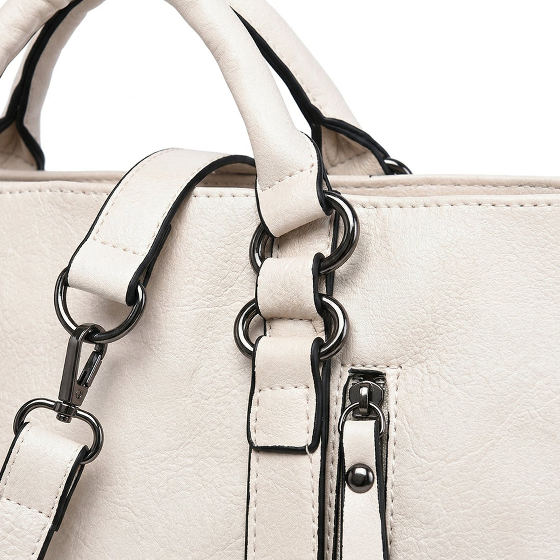 Cremeweiße strukturierte PU-Leder-Handtasche mit schwarzen Kanten, Gunmetal-Hardware und abnehmbarem Schulterriemen Nahaufnahme