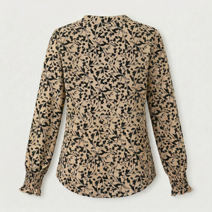 Beige Damenbluse mit schwarzem floralen Muster, langen Puffärmeln und gerafften Bündchen, Rückansicht