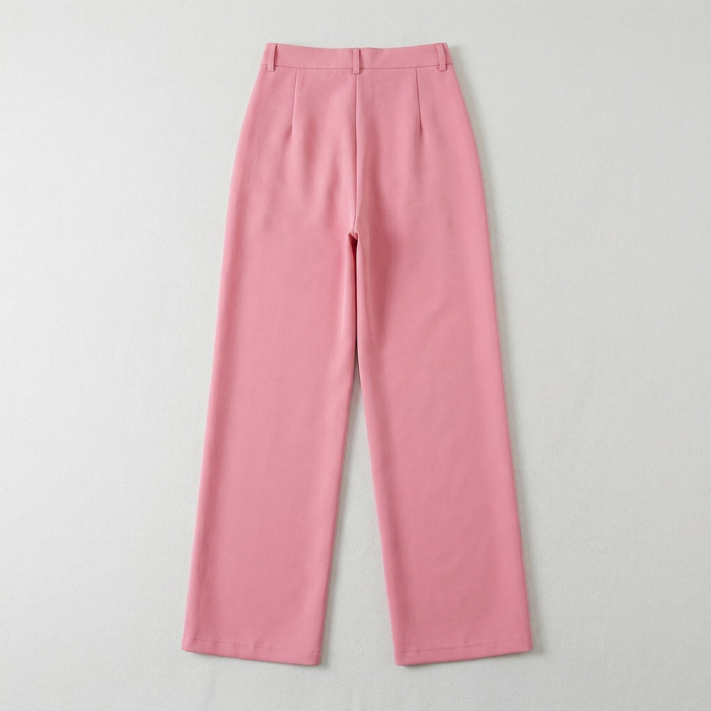 Helle rosa Damenhose mit weitem Bein und hoher Taille, flach liegend