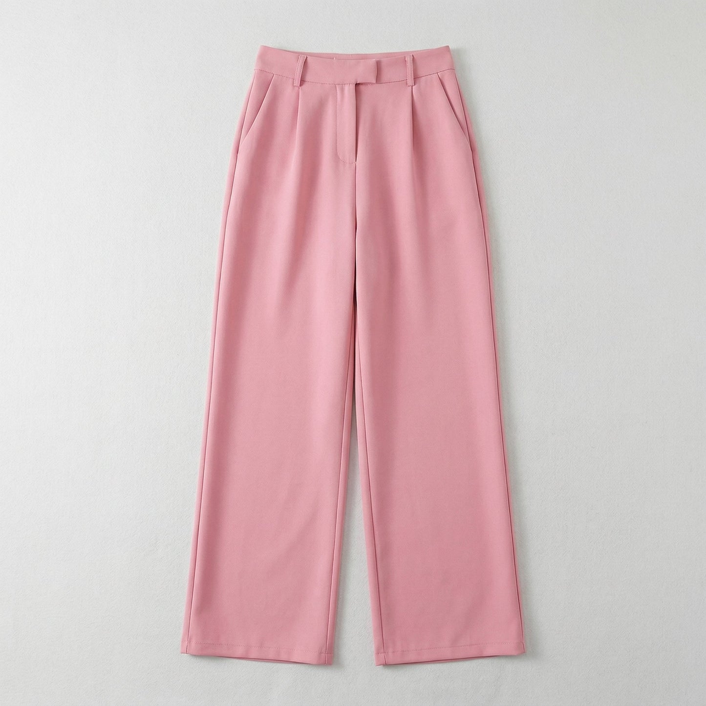 Rosa Damenhose mit hohem Bund, weitem Bein und seitlichen Taschen, flach liegend fotografiert